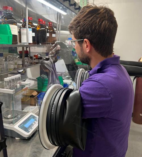 Daniel Straus Research Dr. Daniel Straus using a glovebox in his lab