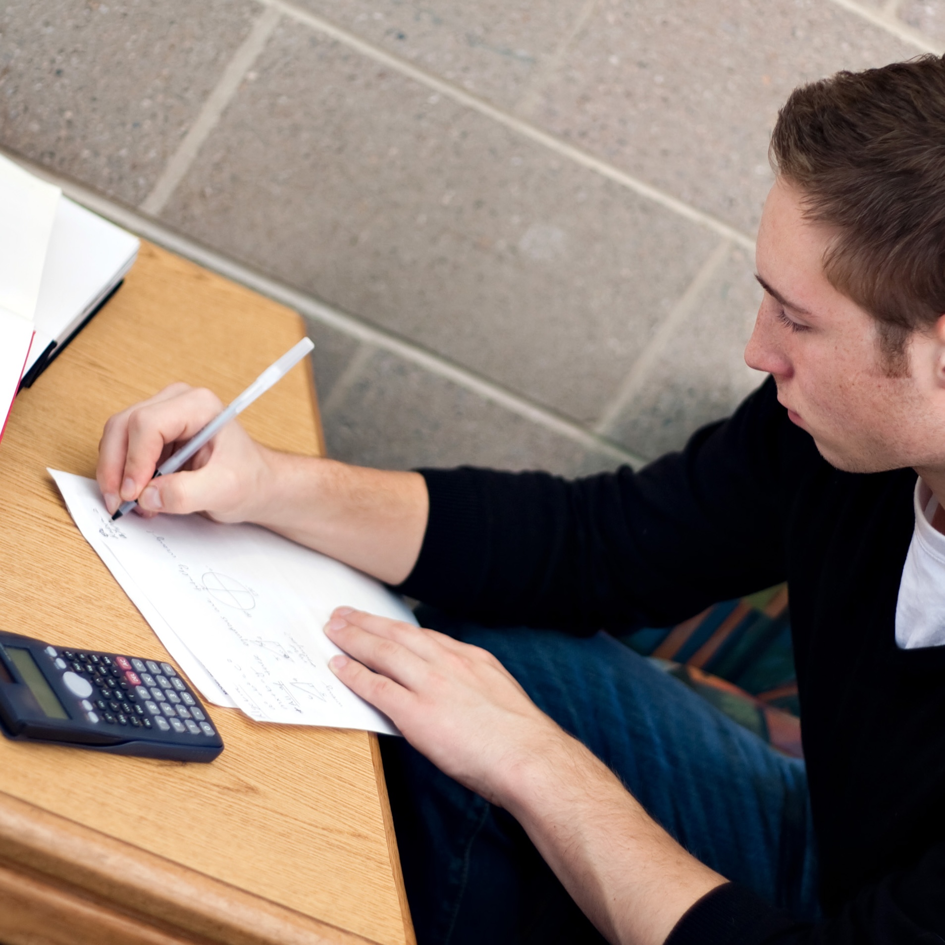 student-working-on-math-homework