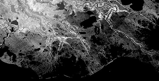 Black and white aerial view of a delta with rivers and lakes.