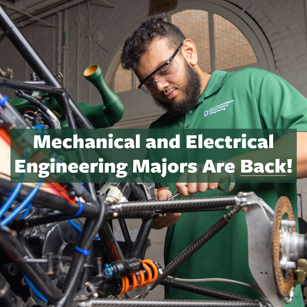 Photograph of an engineering student working on a race car chassis.