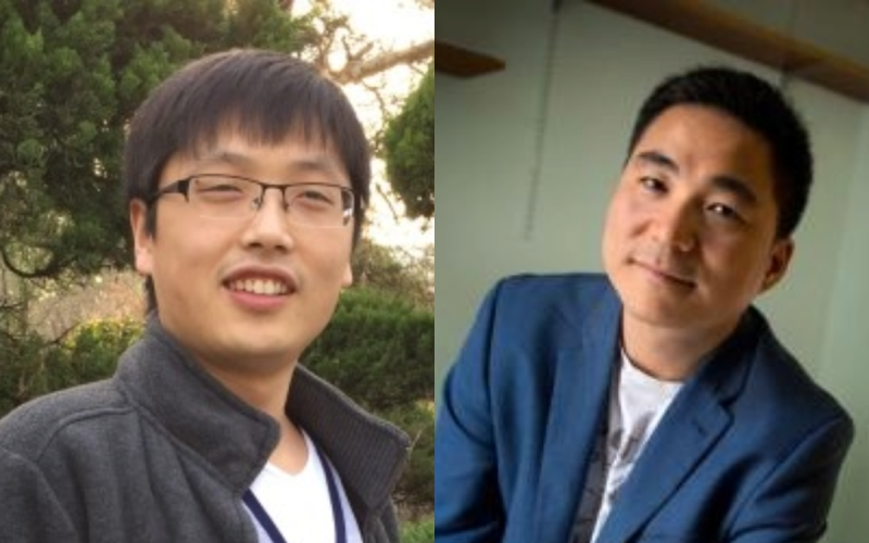 Two Asian men, one in a grey jacket, one in a blue blazer.