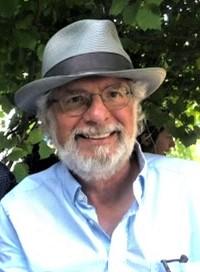 Outdoor portrait of Gary Dohanich wearing a hat