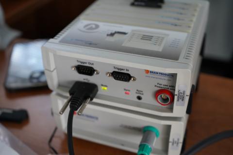Close-up of electronic equipment with multiple ports and lights.